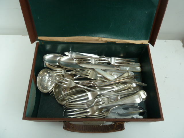A case of various silver plated flatware, including Old Sheffield Plate, forks, ladles,