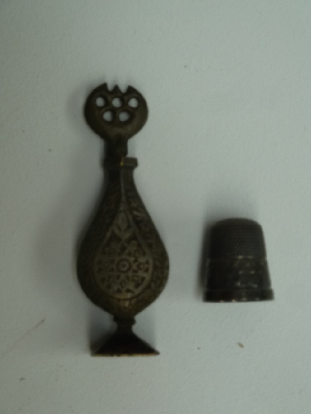 A 19th century Turkish scent bottle, moon and star finial,