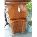 An early 20th century walnut veneer cabinet on chest in the Queen Anne style,