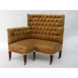 An unusual Edwardian corner sofa, button upholstered in gold material,