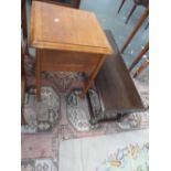 A 1950's oak sewing table, open top with drawer below,