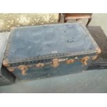 A large Victorian travel trunk, with internal shelf,