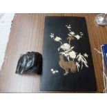 A 20th century Japanese ebonized panel, inset with ivory and mother of pearl,