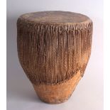 An early 20th century West African cow hide drum,