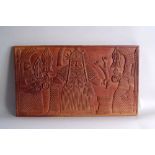 A West African carved panel on hardwood, depicting Yoruba warriors,