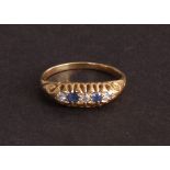 A Victorian gold, diamond and sapphire cushion set four stone engagement ring,