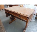 A Victorian oak sofa table, in Gothic taste, rectangular top and leaves,