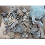 A box of excavated items, including miniature soldiers, musket balls, a kettle,