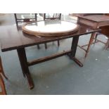 A pair of refectory style stained oak rectangular tables, on square legs with stretcher,