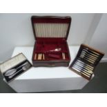 A cased set of six early 20th century silver plated fish knife and forks, in oak case with key,