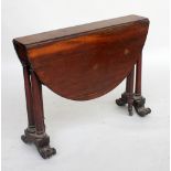 An early Victorian rosewood Sutherland table, the oval top on tapering gun-barrel supports,