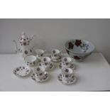 A Royal Albert 'Sweet Violets' part tea set of floral and gilt design over cream ground,