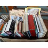 A box of various books, including Mary Queen of Scots,