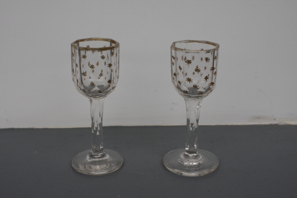 A pair of 18th Century faceted stem glasses with hand painted gilt star pattern and gilt rims 10cmH - Image 4 of 4