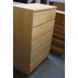 A modern large five drawer chest of drawers,