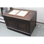 A 20th century oak cupboard unit rectangular top over two cupboards bearing label for Jaycee