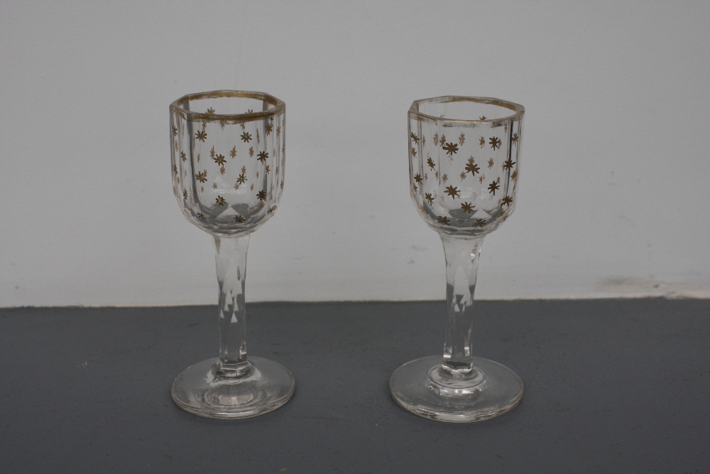 A pair of 18th Century faceted stem glasses with hand painted gilt star pattern and gilt rims 10cmH - Image 3 of 4