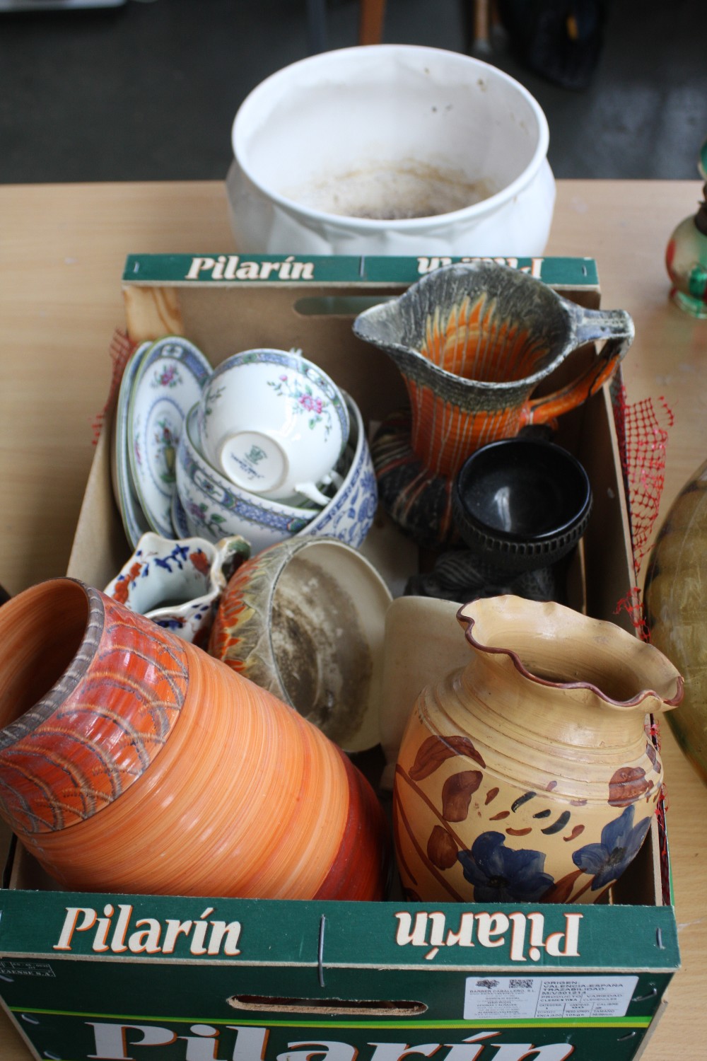 A selection of ceramics including a white glaze planter,