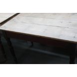 A Victorian pine kitchen table over turned legs 117cmW x 76cmD x 75cmH