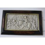 A marble style rectangular plaque depicting a cherub group with a lion, framed,
