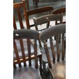 A pair of wicker seated bar back chairs with four others (6)