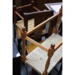 A pair of 1930's oak chairs with drop in gold seats, with a rope seat stool,