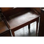 A pine washstand galleried top over turned legs,