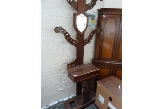 A Victorian walnut hall stand, with four pierced arms above a glove box and umbrella stand base, - Image 3 of 3