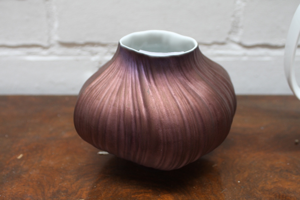 A Rosenthal studio line china vase by Martin Freyer in the form of a stylised garlic with metallic