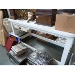 A painted pine kitchen table, drawer below, with square legs,