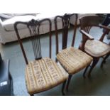 A pair of Edwardian mahogany fiddle back bedroom chairs,