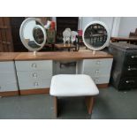 A 20th century Stag bedroom suite, dressing table with two mirrors over six drawers,
