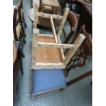 An Edwardian mahogany chair, bowed back with roundels, green leather seat on fluted turned legs,