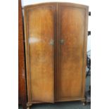 A mid 20th century oak wardrobe, with Camphor stamped to inside,