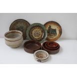 A collection of Art Pottery plates and dishes (9)