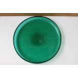 A Holmegaard green bubble glass dish of circular form, marked on base,