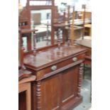 A Victorian mahogany side board, in aesthetic taste with triple mirror,