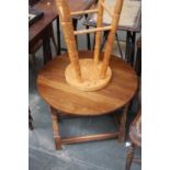 One circular oak small table with a pine stool