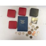 A selection of British, American and world coins, including commemorative crowns,