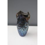 A Contemporary Art glass vase designed by Tom Michael iridescent swirl pattern blue and brown glaze