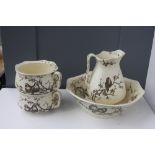 A Almond & Sons china wash bowl and jug, and two chamber pots,