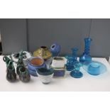 A quantity of studio pottery together with a selection of blue bubble glass items including