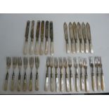 A set of six Edwardian silver plated fish knife and forks, with mother of pearl handles,