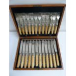 A cased set of silver plated fish knife and forks, by Dixon & Sons, Pimlico, engraved,