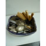 A large selection of silver plated flatware, some with bone handles, including fish knife and forks,