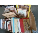A box of various books, including Mary Queen of Scots,