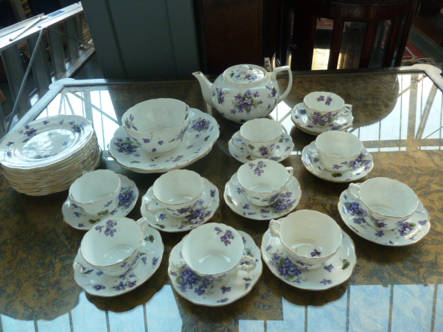 A 36 piece set of Hammersley and co dining and tea set with decorative floral violet design,