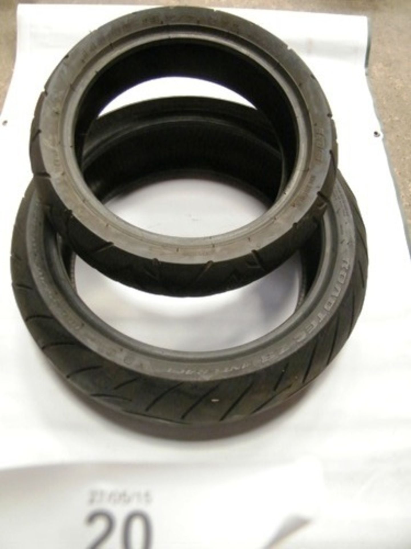 2 x part worn motorcycle tyres, 1 x 180/55 ZR17 M/C (73W) and a 140/60-13 M/C 57L, various states of