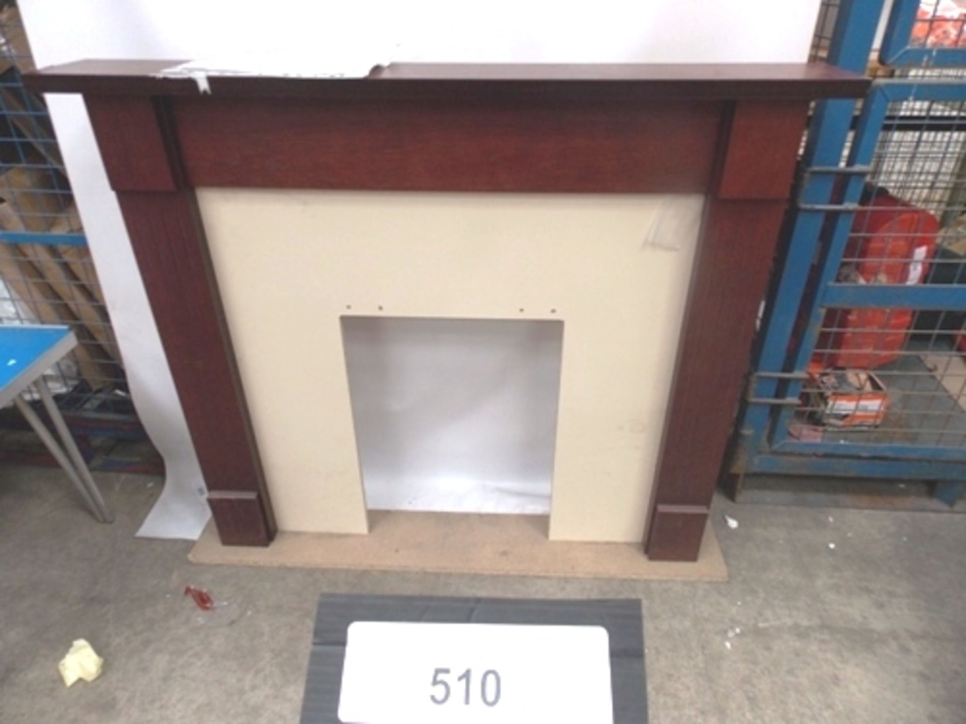 An unbranded large electric fire surround, finished in dark mahogany counter top - Slightly