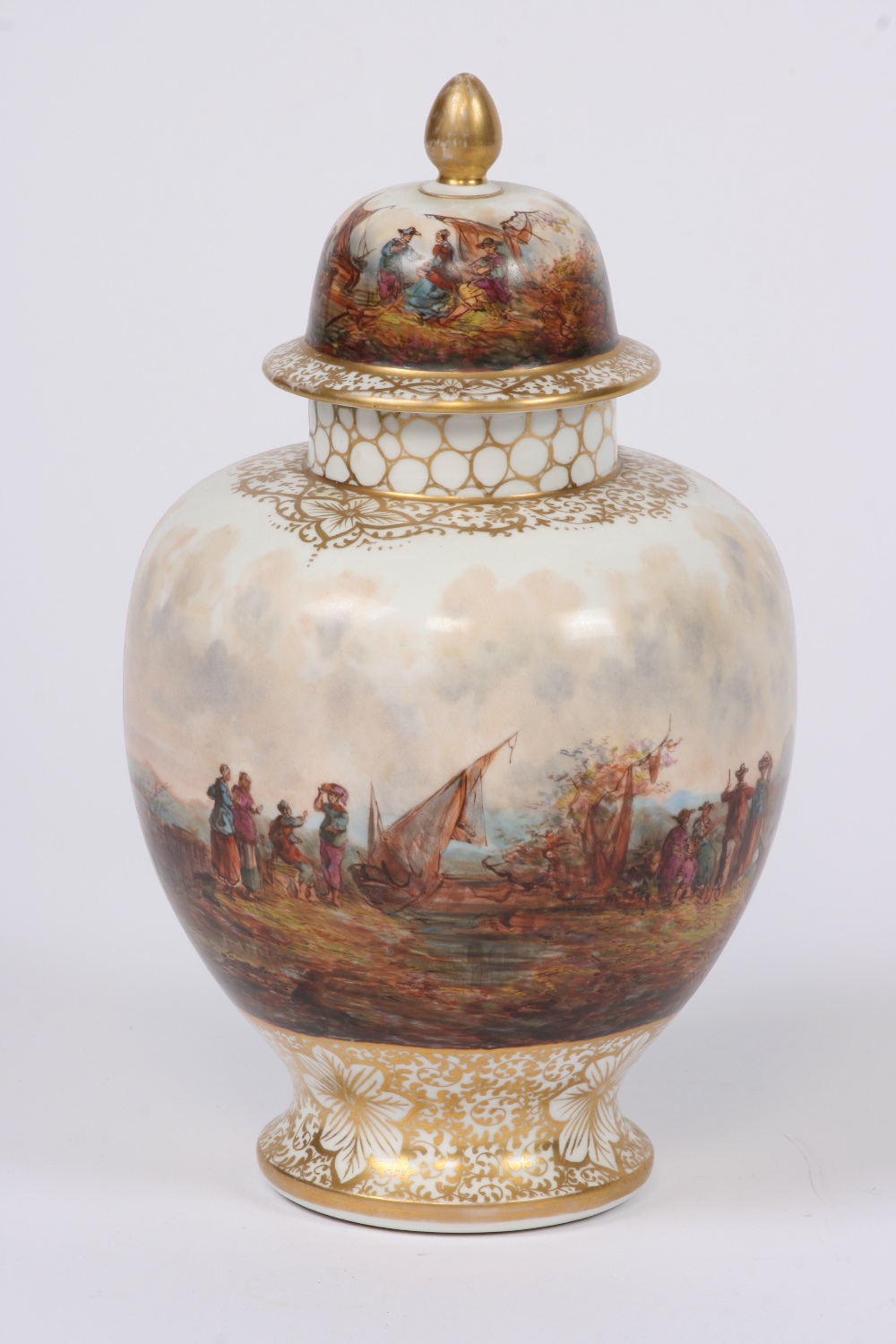 A pair of Dresden floral decorated comports; a Dresden baluster vase, decorated with rural scenes,